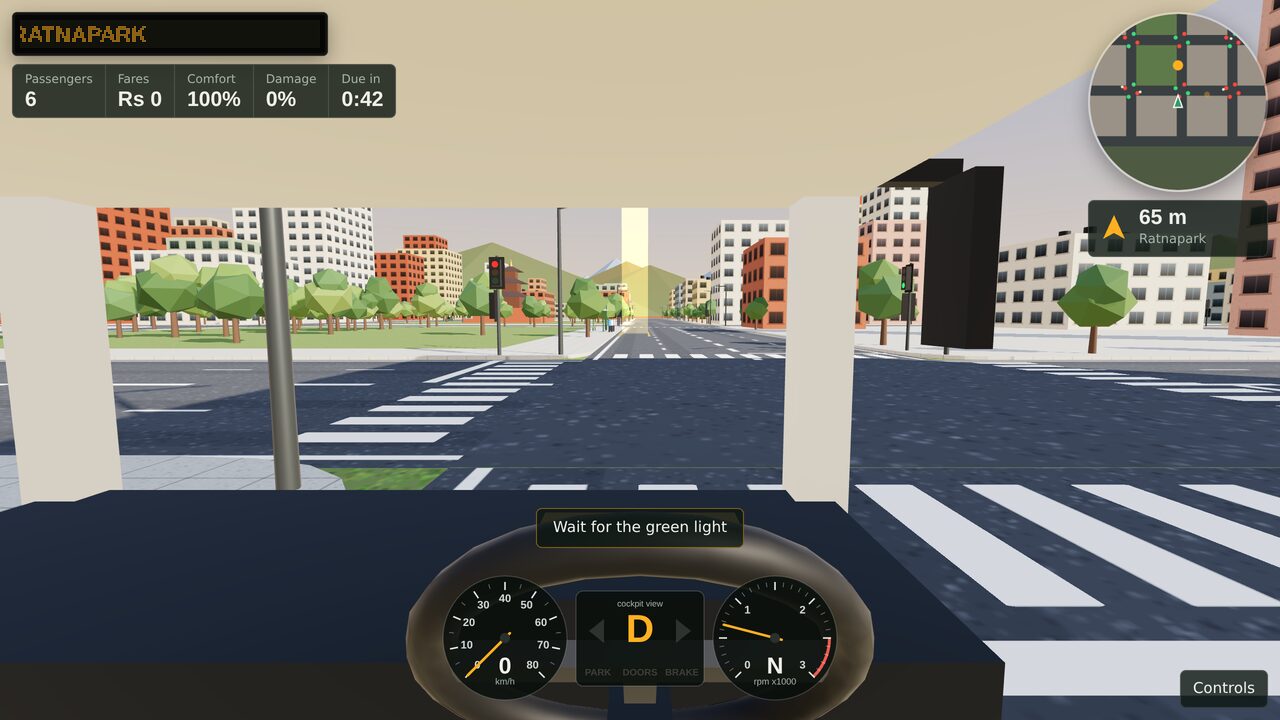The bus waiting at a red traffic light at a city junction